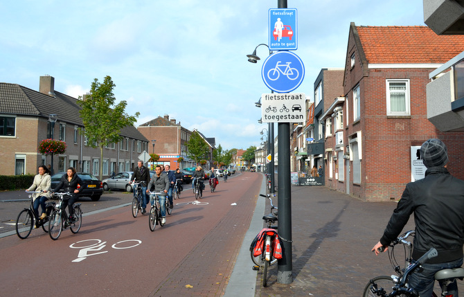 On the Dutch 'fietsstraat', cars are guests. This means that they can still drive here, but they must respect and prioritise people on bicycles