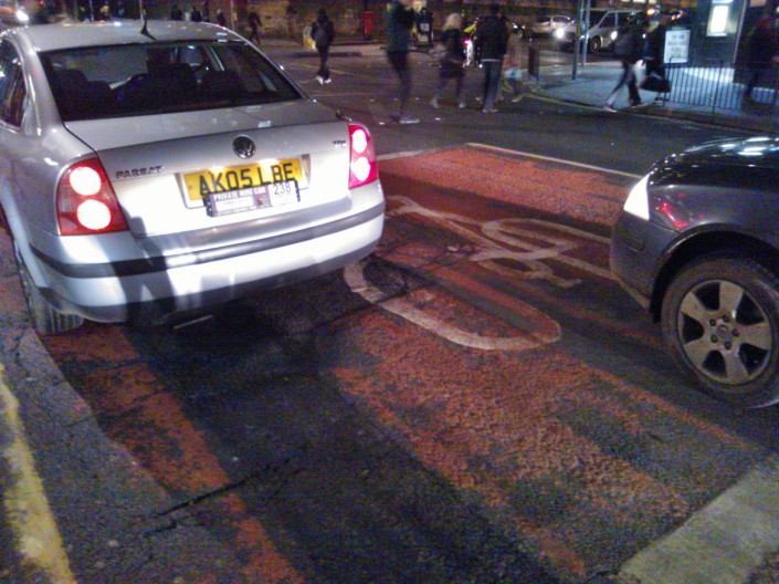 This City of Edinburgh minicab driver pulled in front of me and my girlfriend as we were waiting in the ASL. The car to the right of the picture takes a cue from the taxi driver and edges into the bike box as well. I ask you, is nothing sacred any more?