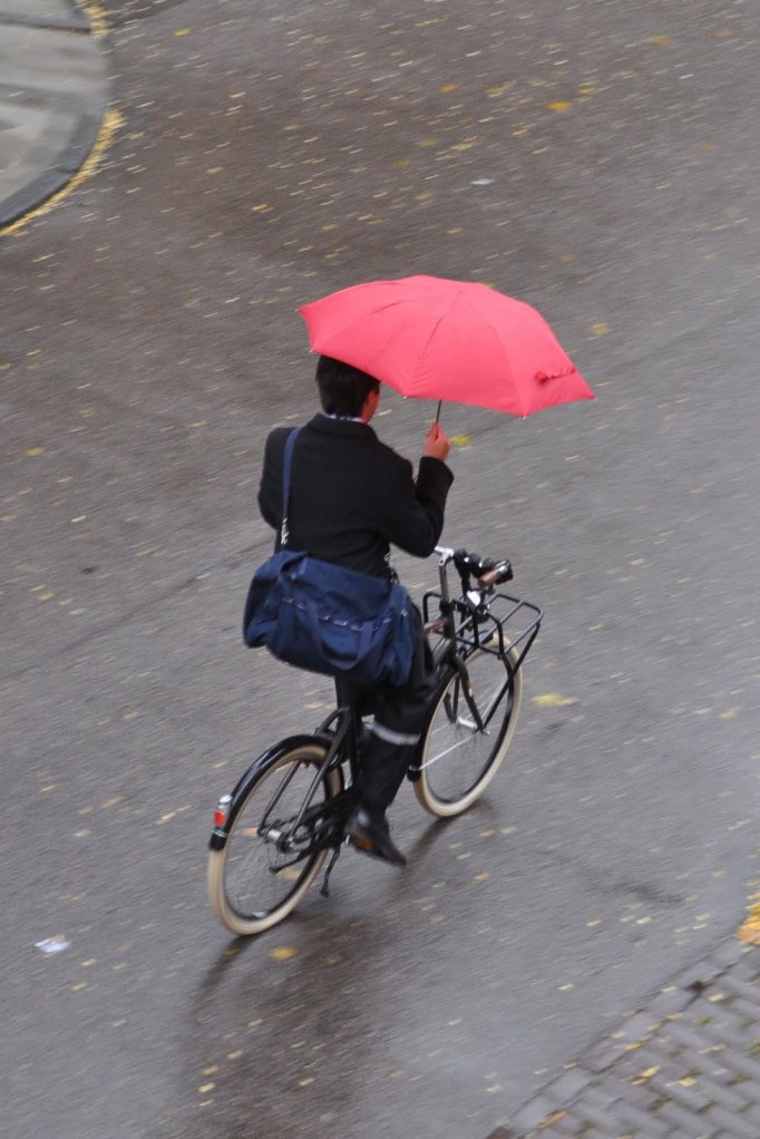 cycling with umbrella